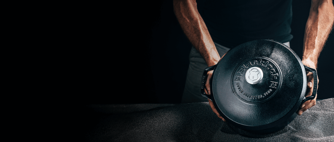 Man holding a dutch oven